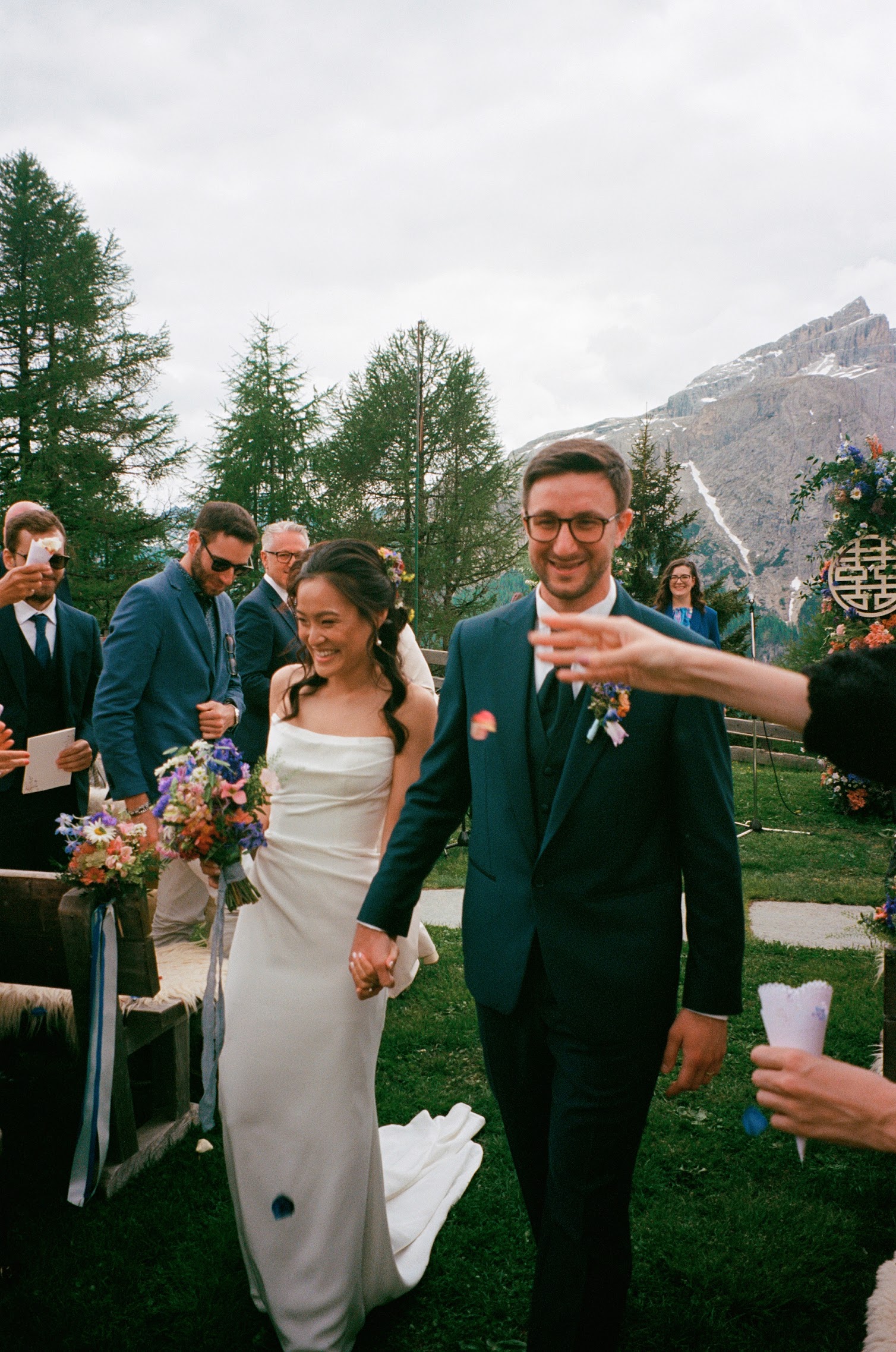 Outdoor celebration with guests in formal dress